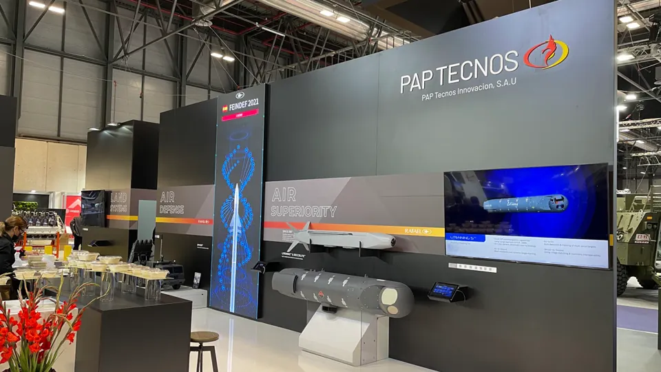 Stand installation - Digital screens integrated into the PAP Tecnos exhibition space.